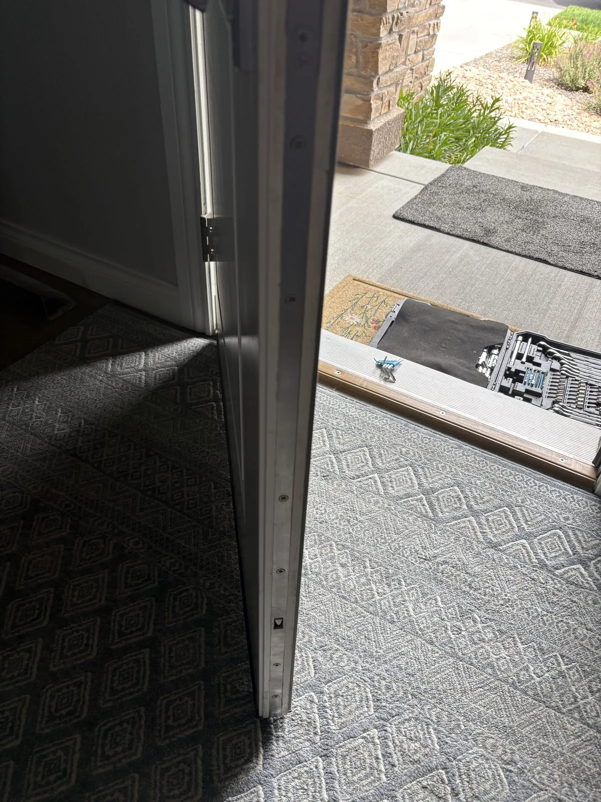 Mobile locksmith providing front door lock service in Colorado Springs