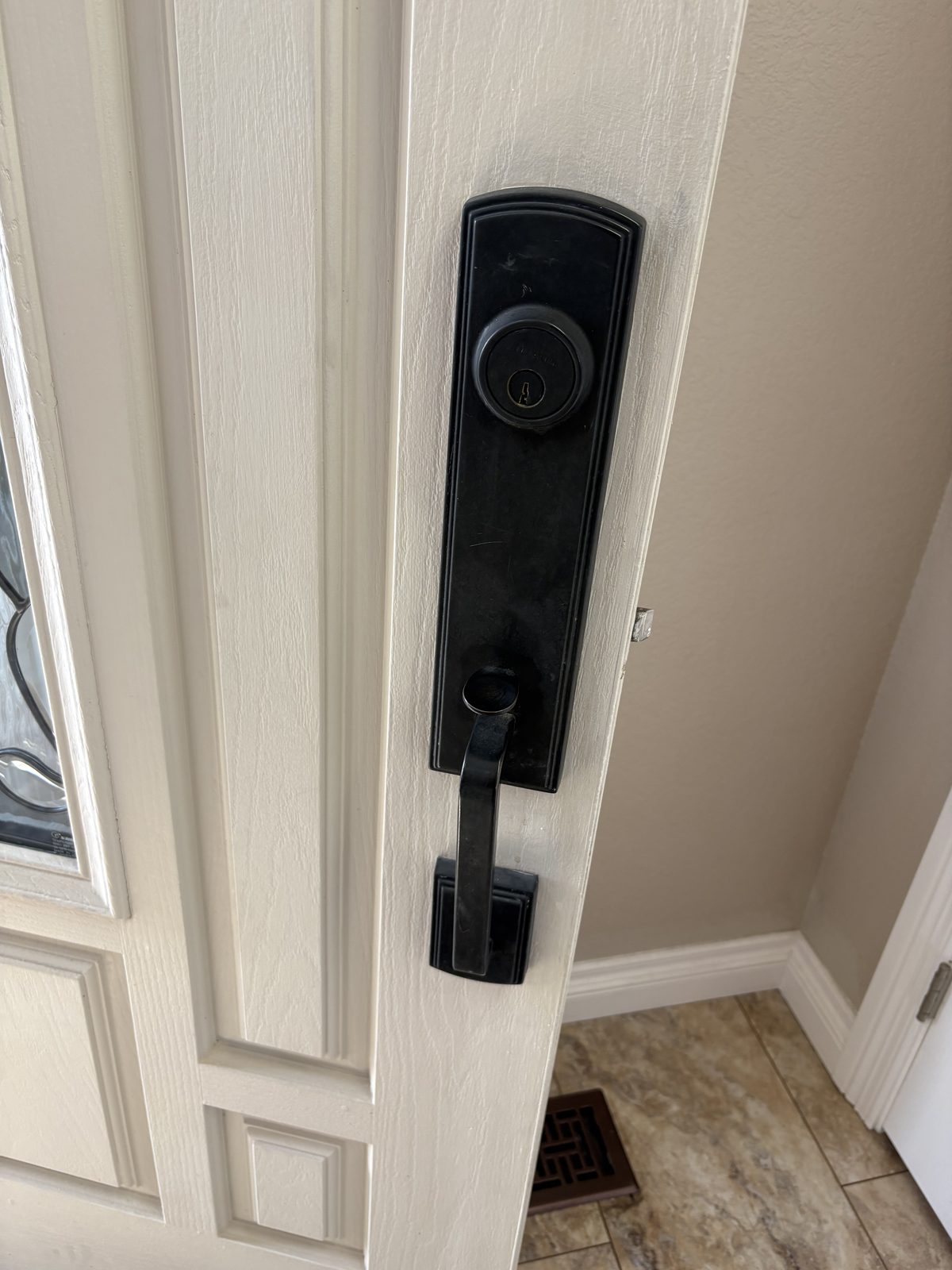 Residential front door handleset for lock rekey service in Colorado Springs