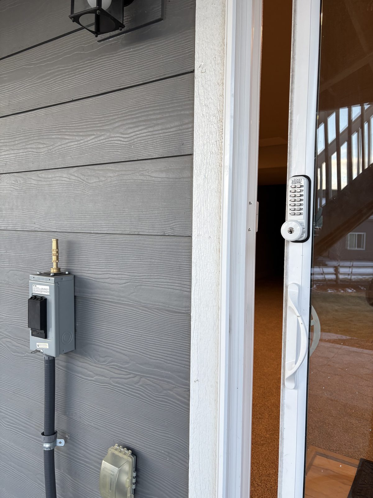 Sliding patio door keypad lock installed for residential security