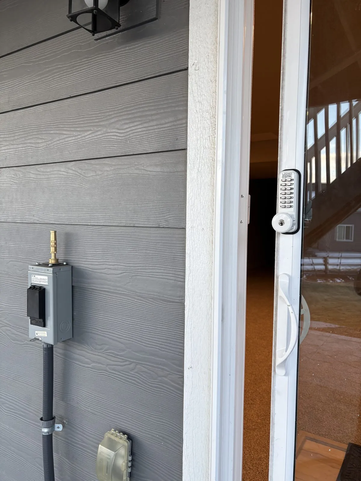 Sliding patio door keypad lock installed for residential security